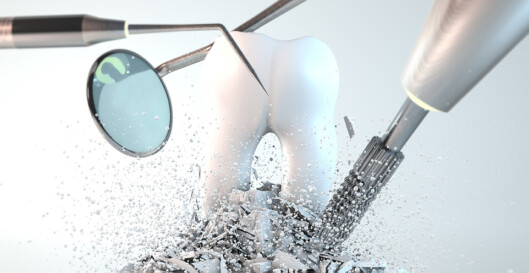 Bild von Zahn der von Werkzeug umgeben ist